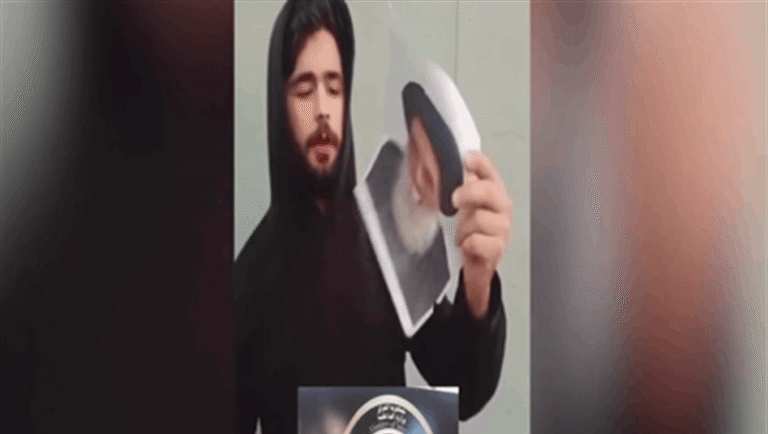 اعتقال-شاب-أحرق-صورة-السيد-السيستاني-في-بغداد-(فيديو)