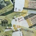 100-دولار-تلامس-27.4-مليون-تومان-في-إيران
